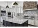 Close up on a kitchen island with granite countertops and stainless steel appliances at 20125 E Melissa Pl, Queen Creek, AZ 85142