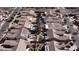 Aerial view of single Gathering homes with pools and desert landscaping in a planned community at 2089 E Lynx Pl, Chandler, AZ 85249