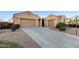 Well-maintained home featuring a spacious three-car garage and inviting curb appeal at 2089 E Lynx Pl, Chandler, AZ 85249