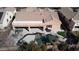 Aerial view of a backyard pool, patio, and outdoor living space at 2089 E Lynx Pl, Chandler, AZ 85249