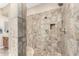 Luxurious shower features custom tile, and sleek fixtures for an upscale experience at 2089 E Lynx Pl, Chandler, AZ 85249