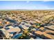 Expansive aerial view of a residential area boasting pools, well-maintained yards, and scenic landscapes at 20981 E Watford Dr, Queen Creek, AZ 85142