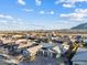 Scenic aerial view of a desert home and landscaped yards showcasing this charming community at 20981 E Watford Dr, Queen Creek, AZ 85142