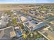 Neighborhood aerial view of a home with a refreshing pool and backyard, perfect for outdoor living at 20981 E Watford Dr, Queen Creek, AZ 85142