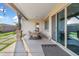 Covered patio with an outdoor dining area that provides shade and relaxation at 20981 E Watford Dr, Queen Creek, AZ 85142