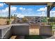 Outdoor kitchen featuring built-in grill and storage, overlooking a picturesque backyard at 20981 E Watford Dr, Queen Creek, AZ 85142