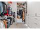 Well-organized walk-in closet with custom shelving and ample storage space at 20981 E Watford Dr, Queen Creek, AZ 85142