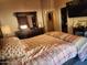 Bedroom featuring a mirror dresser, closet, and TV on the wall at 2150 E Bell Rd # 1048, Phoenix, AZ 85022