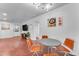 Bright dining area with table, chairs, and ample space, showcasing the home's design at 2209 N 23Rd St, Phoenix, AZ 85006