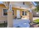 Inviting front porch featuring stylish columns and a 'hello' welcome mat at 2209 N 8Th St, Phoenix, AZ 85006