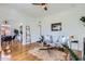 Bright living room with hardwood floors, neutral paint, and stylish decor at 2209 N 8Th St, Phoenix, AZ 85006