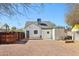 Backyard view highlighting a storage shed, fenced yard, and graveled area at 2237 N 9Th St, Phoenix, AZ 85006