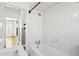 A neutral bathroom with white subway tiles, a shower, and a sink with vanity at 2237 N 9Th St, Phoenix, AZ 85006