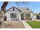 Charming white brick home with a manicured front yard and covered porch at 2237 N 9Th St, Phoenix, AZ 85006