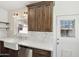 Farmhouse style kitchen with a white countertop, undermount sink, and stainless steel dishwasher at 2237 N 9Th St, Phoenix, AZ 85006