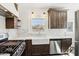 Bright eat-in kitchen with a white countertop, undermount sink, and stainless steel appliances at 2237 N 9Th St, Phoenix, AZ 85006