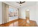 Bright living room with hardwood floors, white walls, and large window allowing natural light at 2237 N 9Th St, Phoenix, AZ 85006