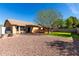 Expansive backyard features a deck, rock landscaping, and a well-maintained lawn at 2251 E Remington Pl, Chandler, AZ 85286