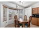 Bright dining room featuring a windowed nook and classic table, ideal for Gathering meals at 2251 E Remington Pl, Chandler, AZ 85286