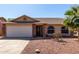 Charming single-Gathering home showcasing a two-car garage, desert landscaping, and a welcoming entrance at 2251 E Remington Pl, Chandler, AZ 85286