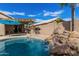 An expansive backyard with a pool and desert landscaping at 2263 E Mariposa Grande --, Phoenix, AZ 85024