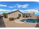 An amazing backyard with a luxurious swimming pool and desert landscaping at 2263 E Mariposa Grande --, Phoenix, AZ 85024