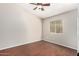 Bedroom featuring a window and dark floors at 2263 E Mariposa Grande --, Phoenix, AZ 85024