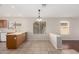 Bright eat-in kitchen featuring tile floors, wood cabinets and lots of light from backyard view at 2263 E Mariposa Grande --, Phoenix, AZ 85024