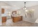 Bright eat-in kitchen featuring tile floors, wood cabinets and lots of light from backyard view at 2263 E Mariposa Grande --, Phoenix, AZ 85024