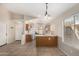 Bright eat-in kitchen featuring tile floors, wood cabinets and lots of light from backyard view at 2263 E Mariposa Grande --, Phoenix, AZ 85024