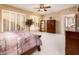 Serene main bedroom featuring ample storage and a serene color palette with carpet flooring at 23318 N Las Positas Ct, Sun City West, AZ 85375