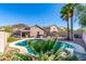 A relaxing backyard oasis with a pool, desert landscaping and patio with a jacuzzi at 23402 N 22Nd Way, Phoenix, AZ 85024