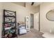 Carpeted bedroom with neutral paint and shelving at 23402 N 22Nd Way, Phoenix, AZ 85024