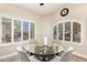 Bright dining nook with white plantation shutters and views of the exterior at 23402 N 22Nd Way, Phoenix, AZ 85024