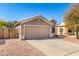 Single story home with a two-car garage and low maintenance gravel landscaping at 23402 N 22Nd Way, Phoenix, AZ 85024