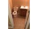 Compact powder room with a single vanity and toilet, conveniently located for guests at 25646 W Elwood St, Buckeye, AZ 85326