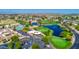 Beautiful aerial view of the community clubhouse, pool, pond and golf course at 25822 S Eastlake Dr, Sun Lakes, AZ 85248