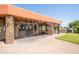 Inviting clubhouse patio with misting system for hot days at 25822 S Eastlake Dr, Sun Lakes, AZ 85248