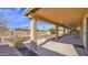 Back patio featuring desert landscaping and a covered overhang at 25822 S Eastlake Dr, Sun Lakes, AZ 85248