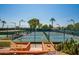 Image of pickleball courts featuring lush landscaping and various desert plants, including cacti at 25822 S Eastlake Dr, Sun Lakes, AZ 85248