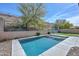 Sparkling pool with landscaping including a hillside view, ideal for outdoor enjoyment at 25951 N 106Th Dr, Peoria, AZ 85383