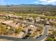 Scenic aerial shot of the property highlighting the proximity to the golf course and mountain views at 27913 N Walnut Creek Rd, Rio Verde, AZ 85263