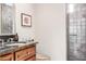 Bathroom with neutral walls, granite counters and walk-in shower with tile surround at 27913 N Walnut Creek Rd, Rio Verde, AZ 85263