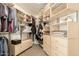 Spacious walk-in closet features custom shelving and storage drawers at 2909 N 111Th Dr, Avondale, AZ 85392