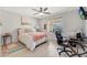 Bedroom with a ceiling fan, natural light, and carpet at 29681 W Amelia Ave, Buckeye, AZ 85396