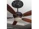 Wood-bladed ceiling fan with vintage detailing offers both style and efficient air circulation at 3212 E Constance Way, Phoenix, AZ 85042