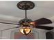 The dining room ceiling fan is both ornamental and functional at 3212 E Constance Way, Phoenix, AZ 85042