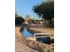 Tranquil community canal with clear water and lush surroundings at 3212 E Constance Way, Phoenix, AZ 85042