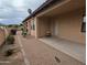 Side view of the home highlighting architectural details and well-kept landscaping at 3212 E Constance Way, Phoenix, AZ 85042