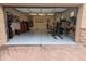 Spacious two-car garage with epoxy floor and plenty of room for workout equipment at 3212 E Constance Way, Phoenix, AZ 85042